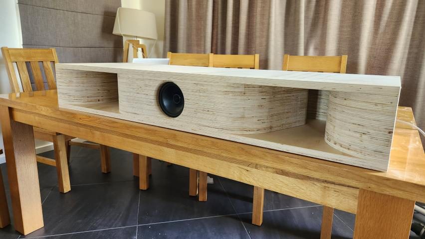 Dual back-loaded horn speaker built into a plywood desk